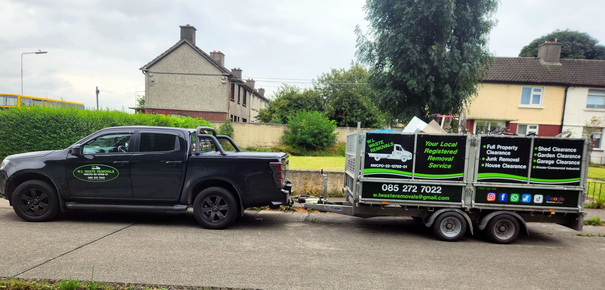 W.L Waste Removals pickup and caged trailer parked on a Dublin street