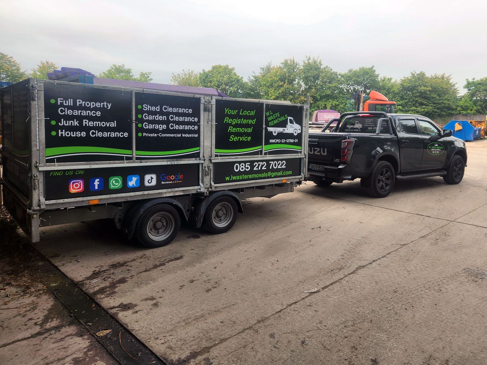 W.L Waste Removals pickup and signed trailer